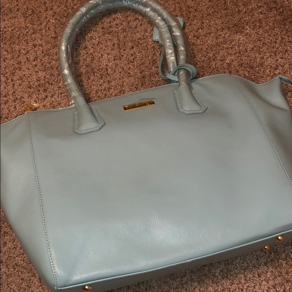 NWT Tote bag with hidden gadgets..